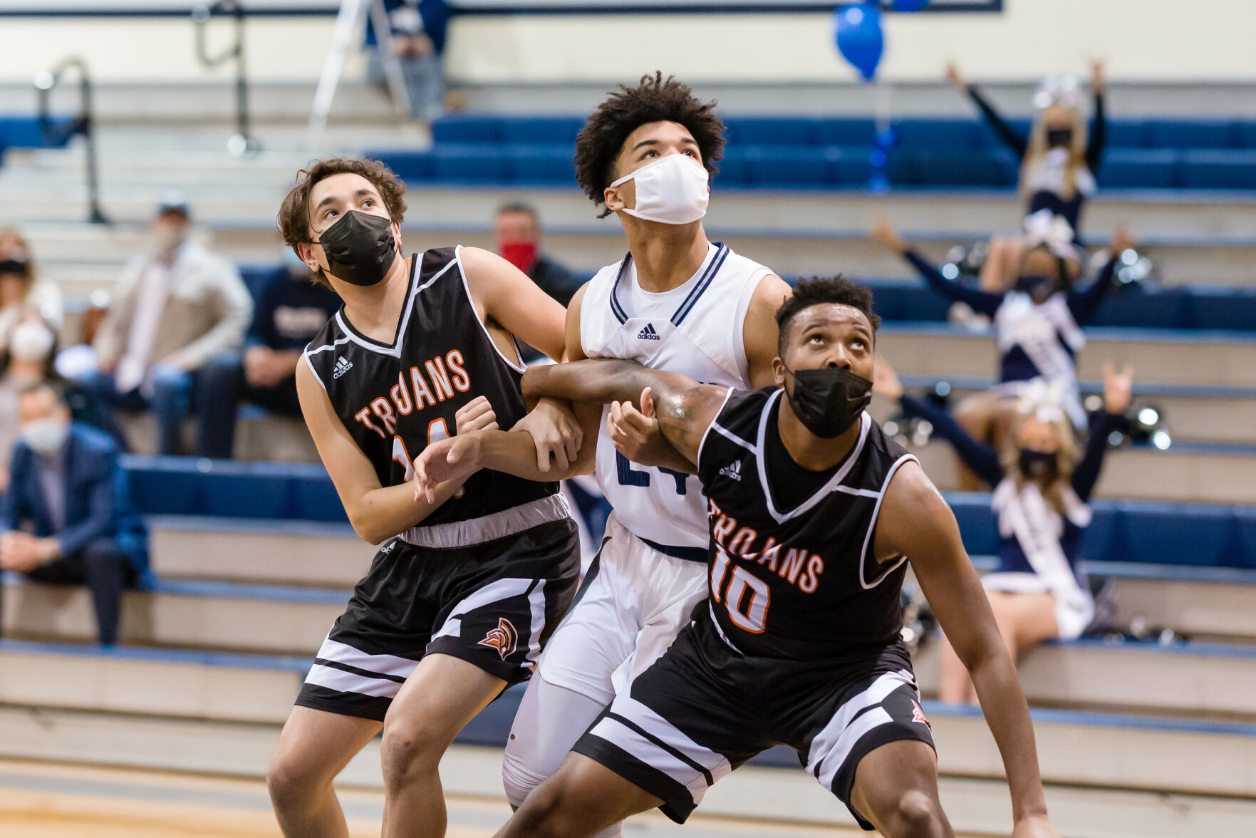 Boys Basketball: Hickory Ridge RaginÕ Bulls defeated the Northwest Cabarrus Trojans 64-56.